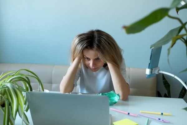 Woman freelancer in stress. No ideas. Emotional burnout at work